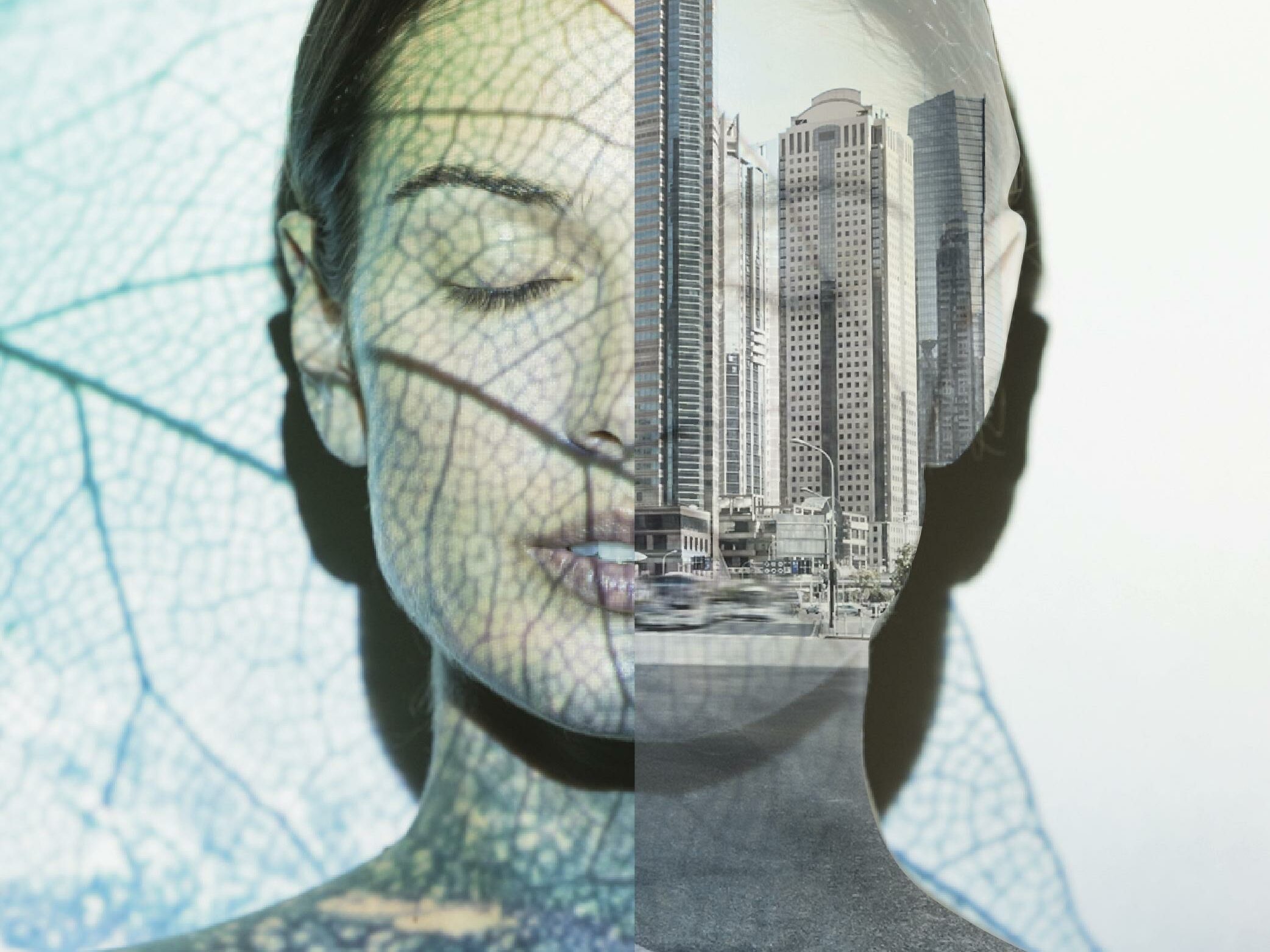 Industrial Beauty A composite image featuring a woman's face and upper body, blended with a leaf pattern on the left side and a cityscape with skyscrapers on the right. The left side represents nature, while the right side symbolizes an urban environment.