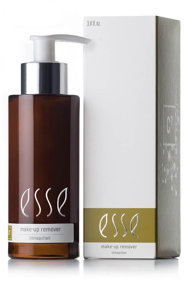 A brown pump bottle labeled "Esse Make-up Remover" stands next to its box with matching branding. The box is white with gold accents and has the same "Esse Make-up Remover" text on it. The bottle contains 3.4 fl oz of product.